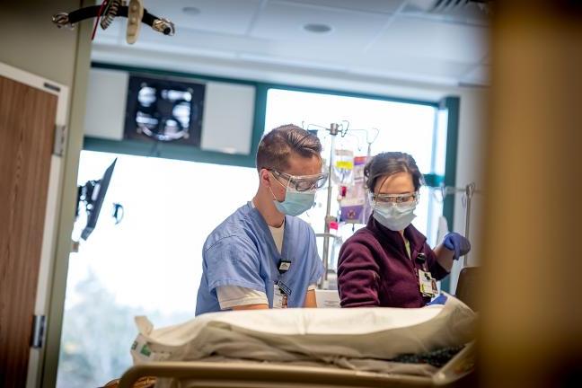 Student nurses working with patients